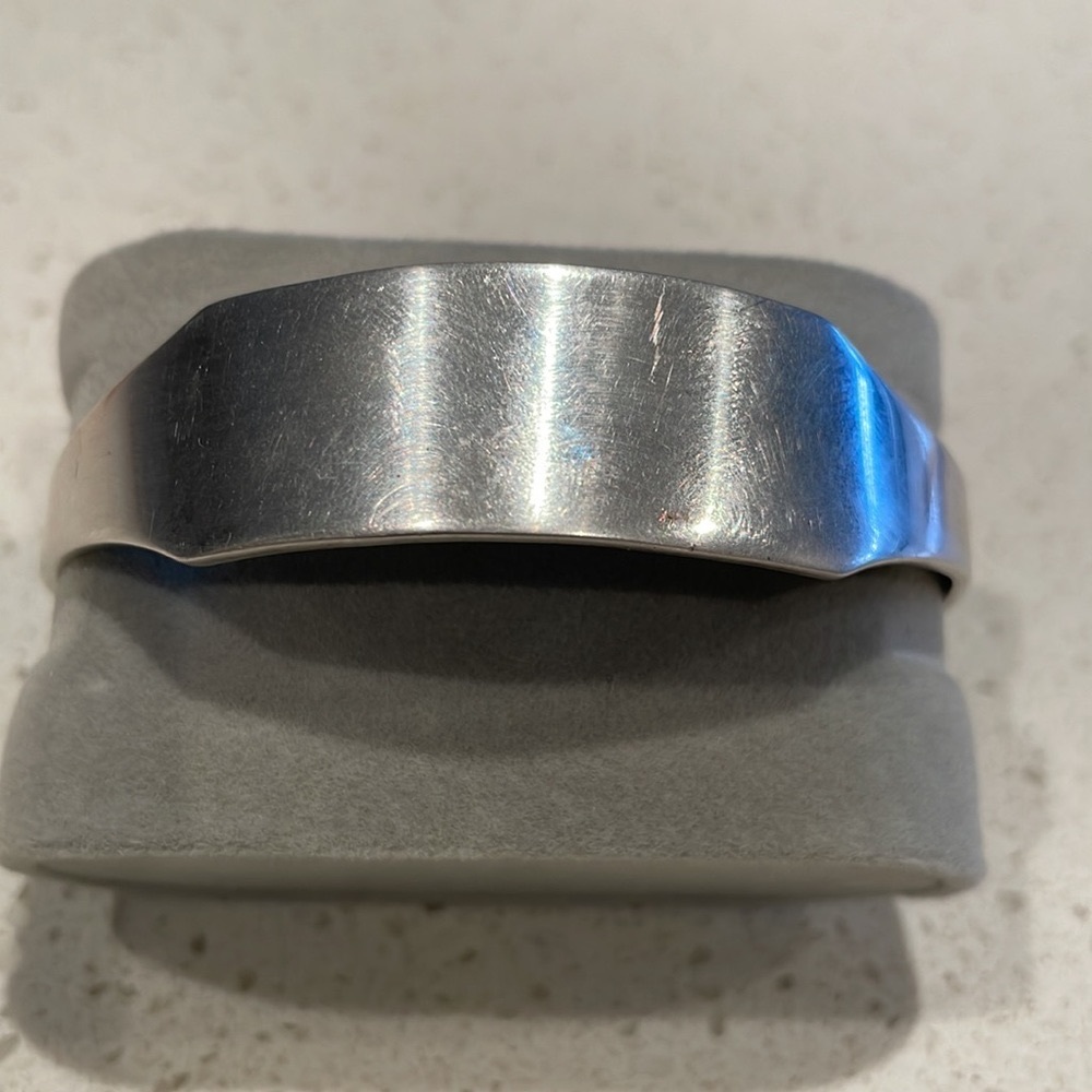 Cartier unisex “medical alert” silver cuff.